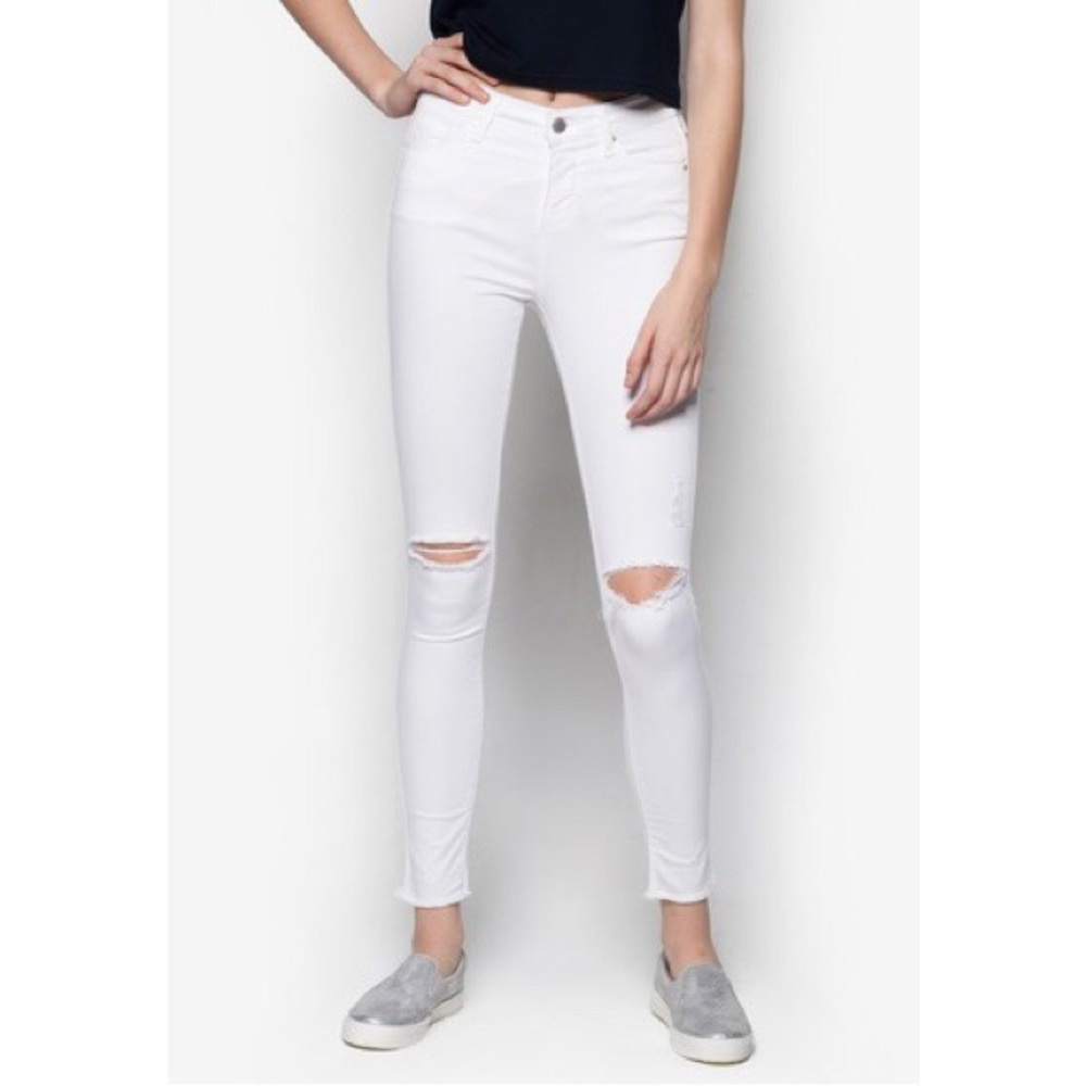 White jeans with rips